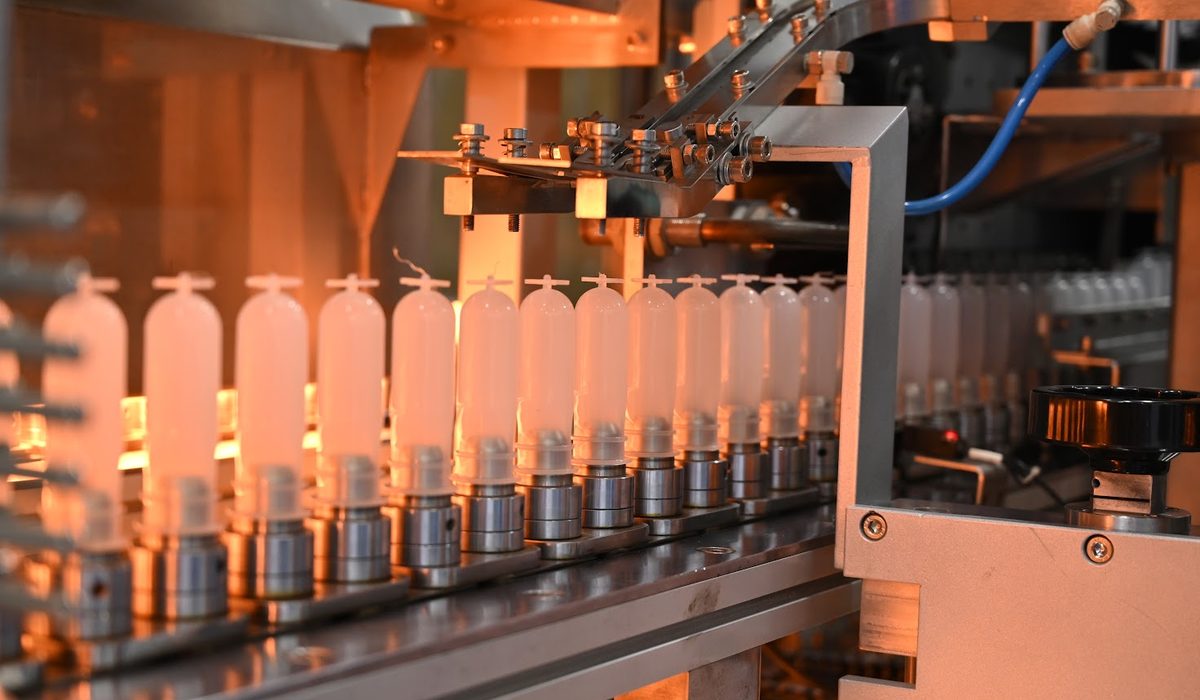 Polypropylene preforms glowing in the heating oven